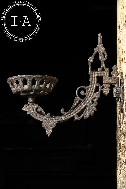 Adjustable Industrial Lighting for Flexible IlluminationEarly 20th Century Cast Iron Oil Lamp Sconce