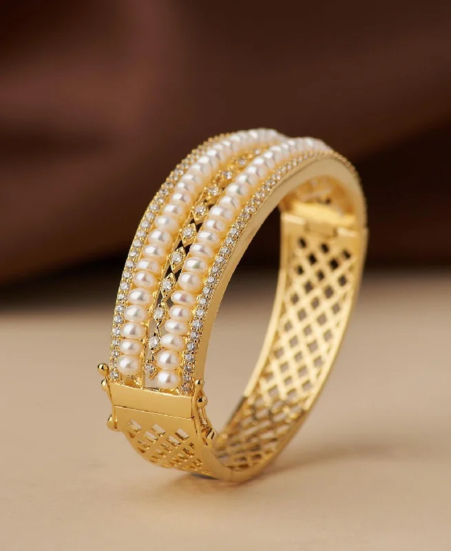 Crystal Ceiling Lights with High - Quality Swarovski CrystalsCrystal Ceiling Lights with High - Quality Swarovski CrystalsDelightful Stone Studded Real Pearl Bangle