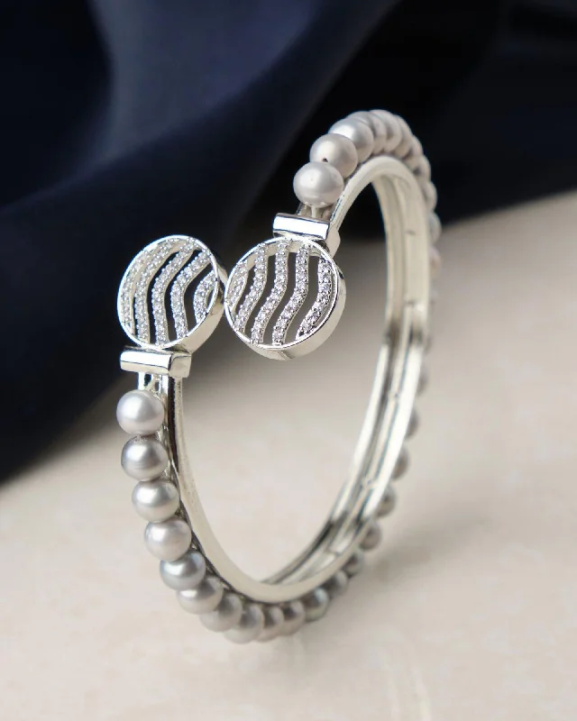 Gothic Ceiling Lights with Dark Metalwork and Pointed ArchesGothic Ceiling Lights with Dark Metalwork and Pointed ArchesDelightful Stone Studded Pearl Bangle
